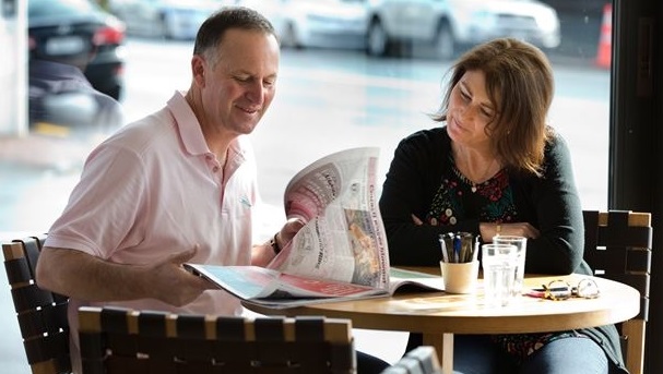 John Key, with his wife Bronagh, having a coffee at their local coffee shop