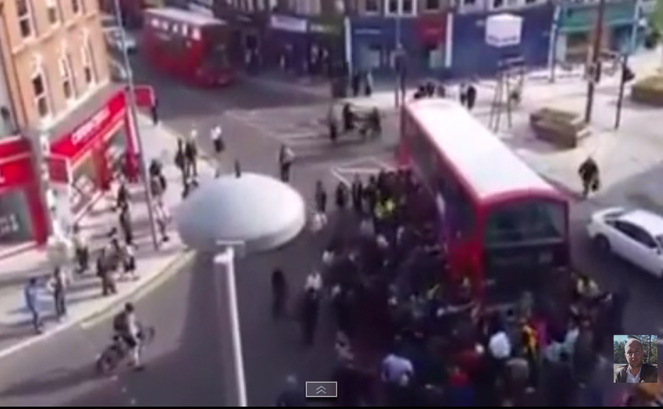 London bus lifted by 100 people to rescue unicyclist