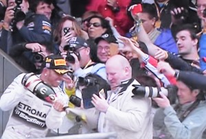 Lewis Hamilton champange splashing