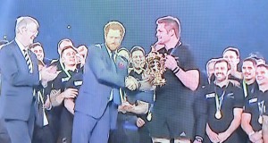 Prince Harry presenting the Rugby World Cup to New Zealand captain 