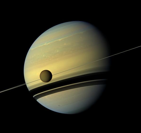 Titan-pictured-infront-of-Saturn-by-Cassini-NASA-jet-propultion-lab.