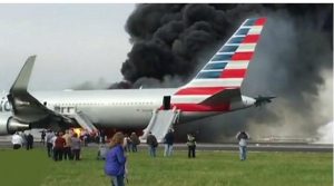 Smoke bellowing out of American Airlines