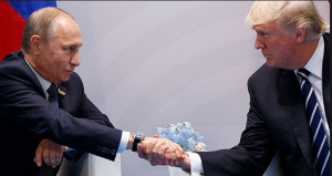 US President Donald Trump shakes hands with Russian President Vladimir Putin at the G20 Summit on Friday 7th July 2017.