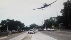 Plane smashes into highway