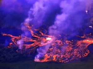 Molten lava cutting main highway in South-East Big Island