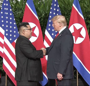 Kim Jong-un skaing President Trumps hand
