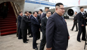 Kim Jung-un and his entourage arriving at Singapore in Air China 747