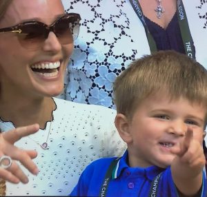 Novak's son and Wife cheering him from the stands