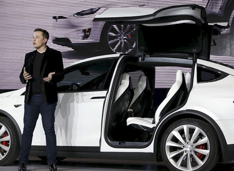 Elon Musk revelaing the Telsa Model Y Crossover