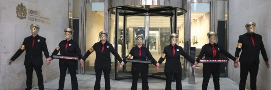 Extinction Rebellion environmental activists glued themselves to the main entrance of the London Stock Exchange