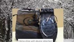 Hiking shoe with device attached.