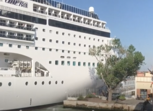 MSC Opera cruise liner ramps  into river boat
