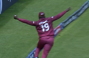 Cottrell takes an incredible catch at the boundary to dismiss Smith