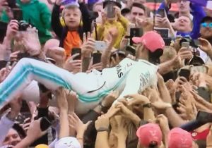 Lewis Hamilton lifted by fans
