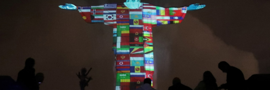 The statue of Christ the Redeemer is lit up in the colors of the countries that are affected by the coronavirus disease (COVID-19) outbreak in Rio de Janeiro