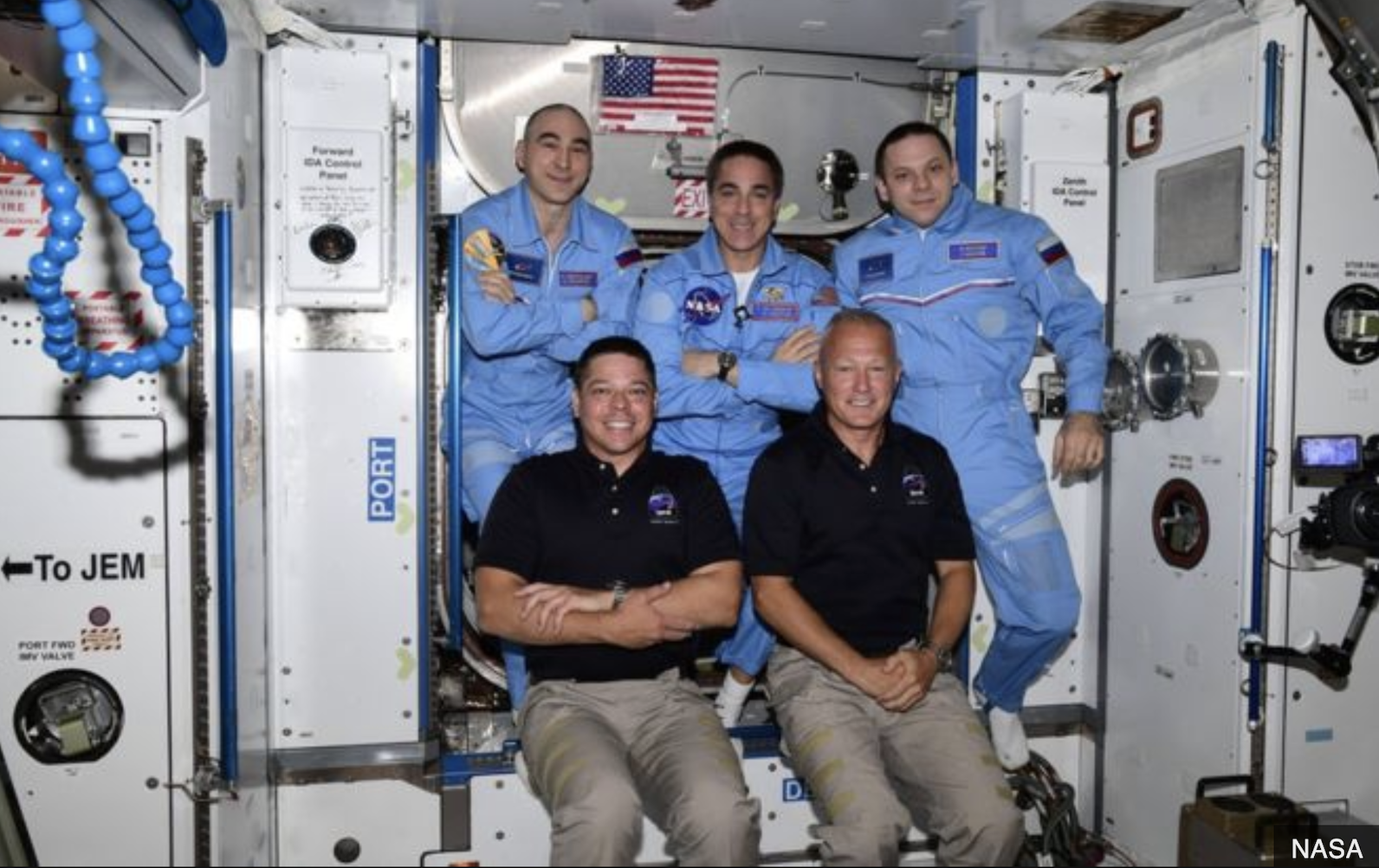 US astronauts Doug Hurley (r) and Bob Behnken (L) front row