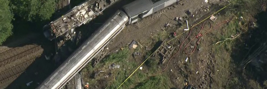 Three dead after train hit landslide and derails