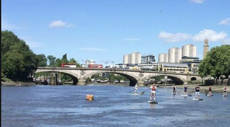 Paddlebaoring in the Thames river.