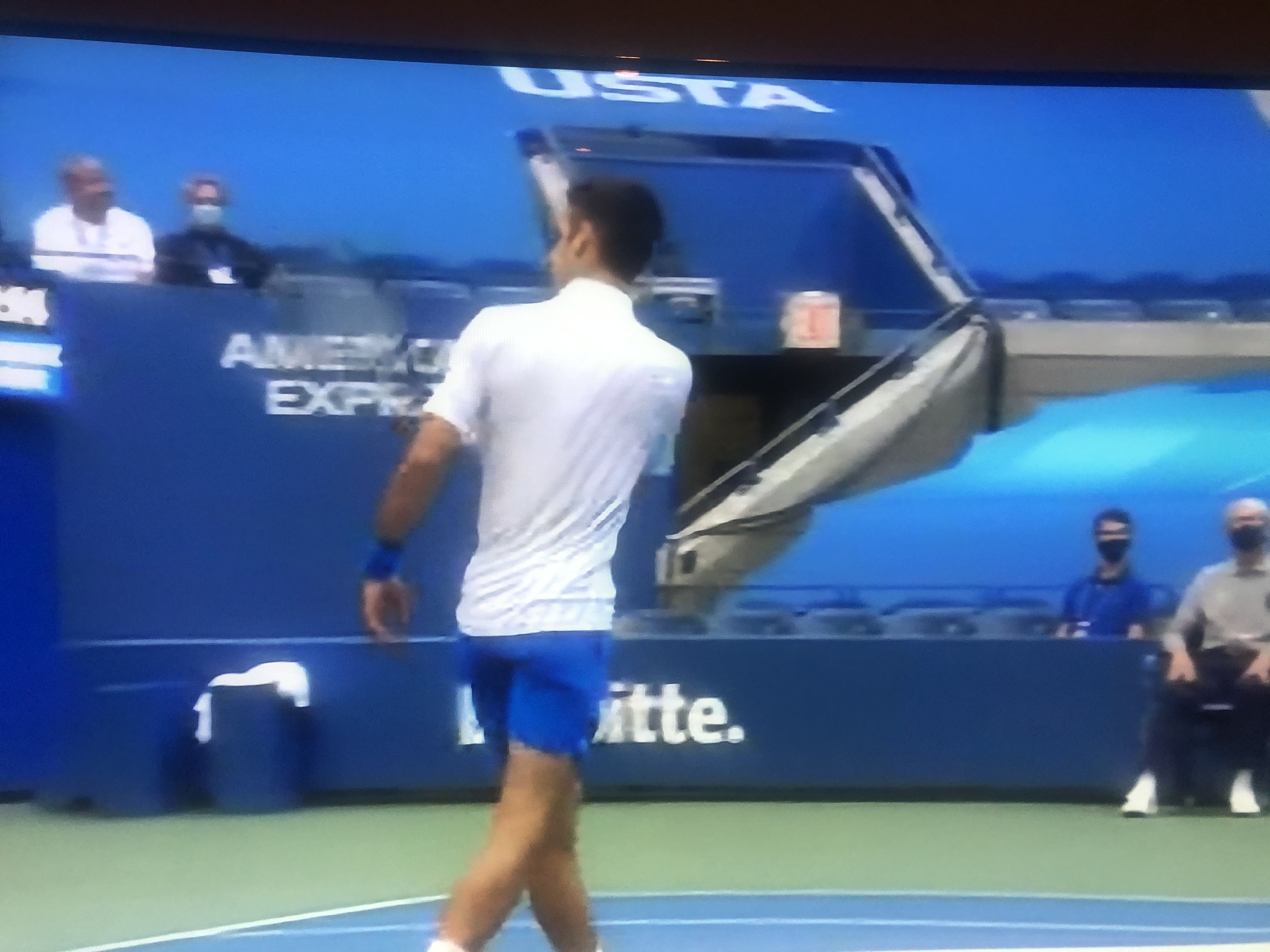 Djokovic hitting the ball