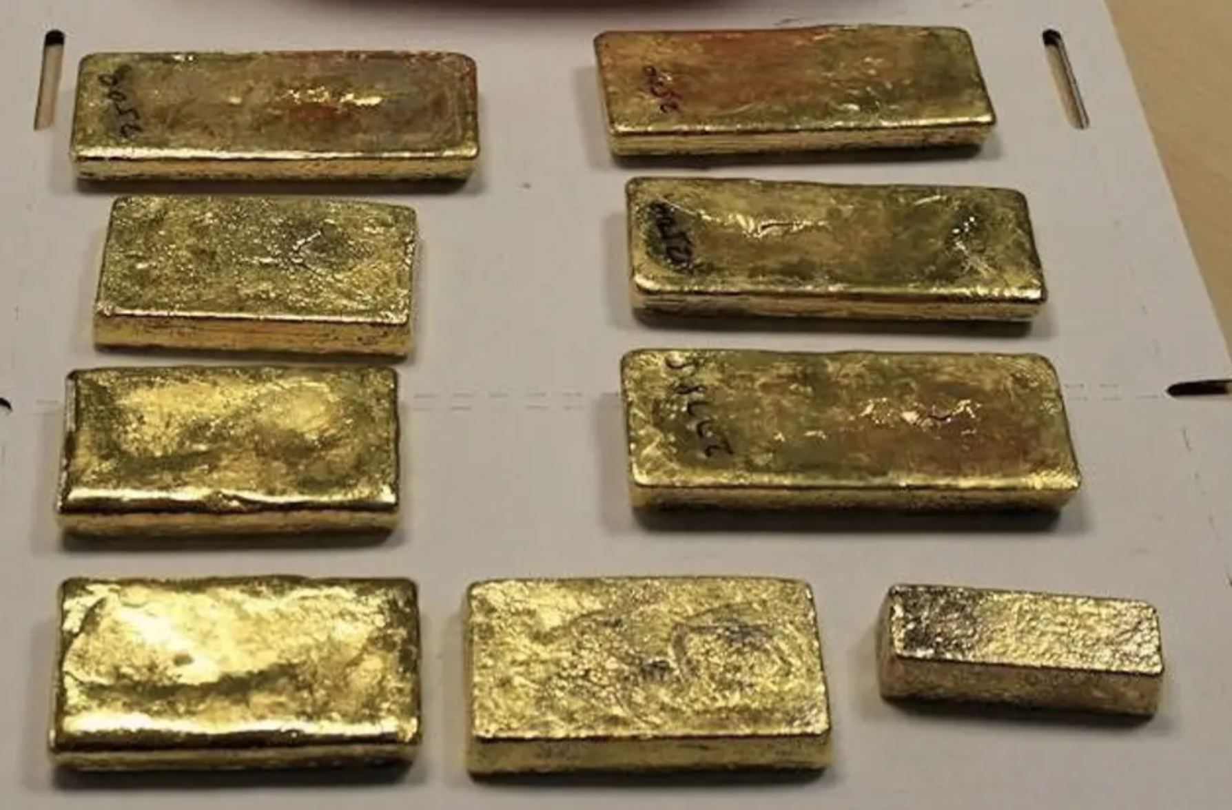 35lbs (16kg) gold bars seized from a Dubai-bound passenger  by HMRC