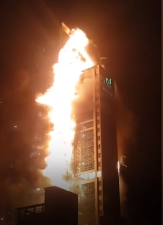 Fire engulfs 33-storey building