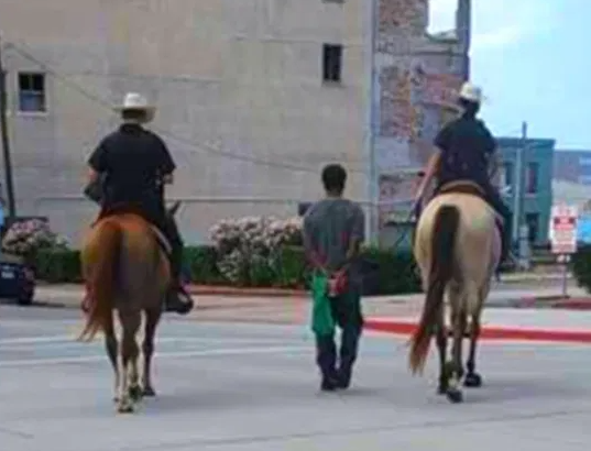 Neely led by cops on horseback