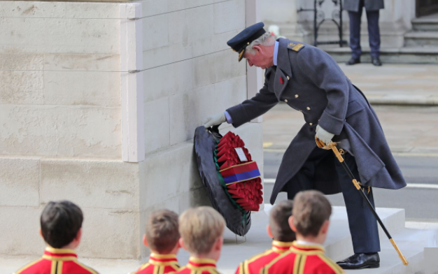 Prince Charles laying wreath of his own and one on behalf of the Queen at Cenotaph
