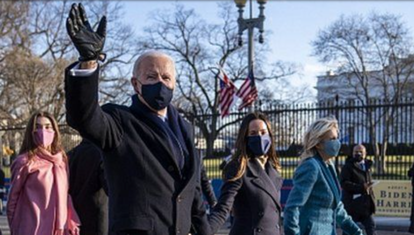 Biden-Harris walking down the Pennsylvania Avenue to the White House