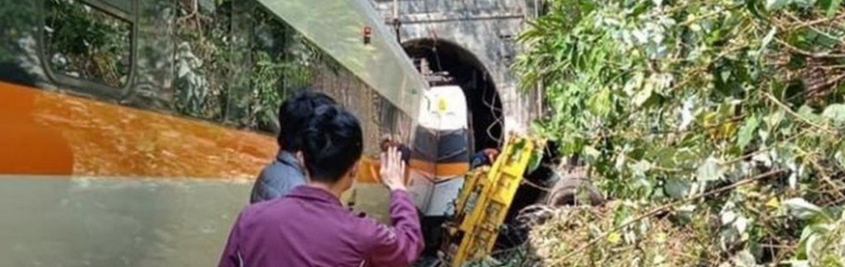 The train as it entered the tunnel hit a yellow flatbed truck near the north end of the tunnel