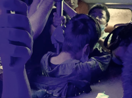 Crowded metro passengers submerged inside the tube