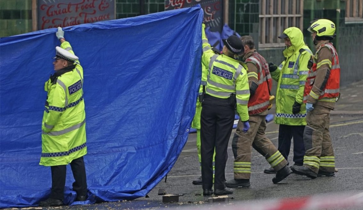 Crashed car caught fire after it hit a block of flats on Great West Road