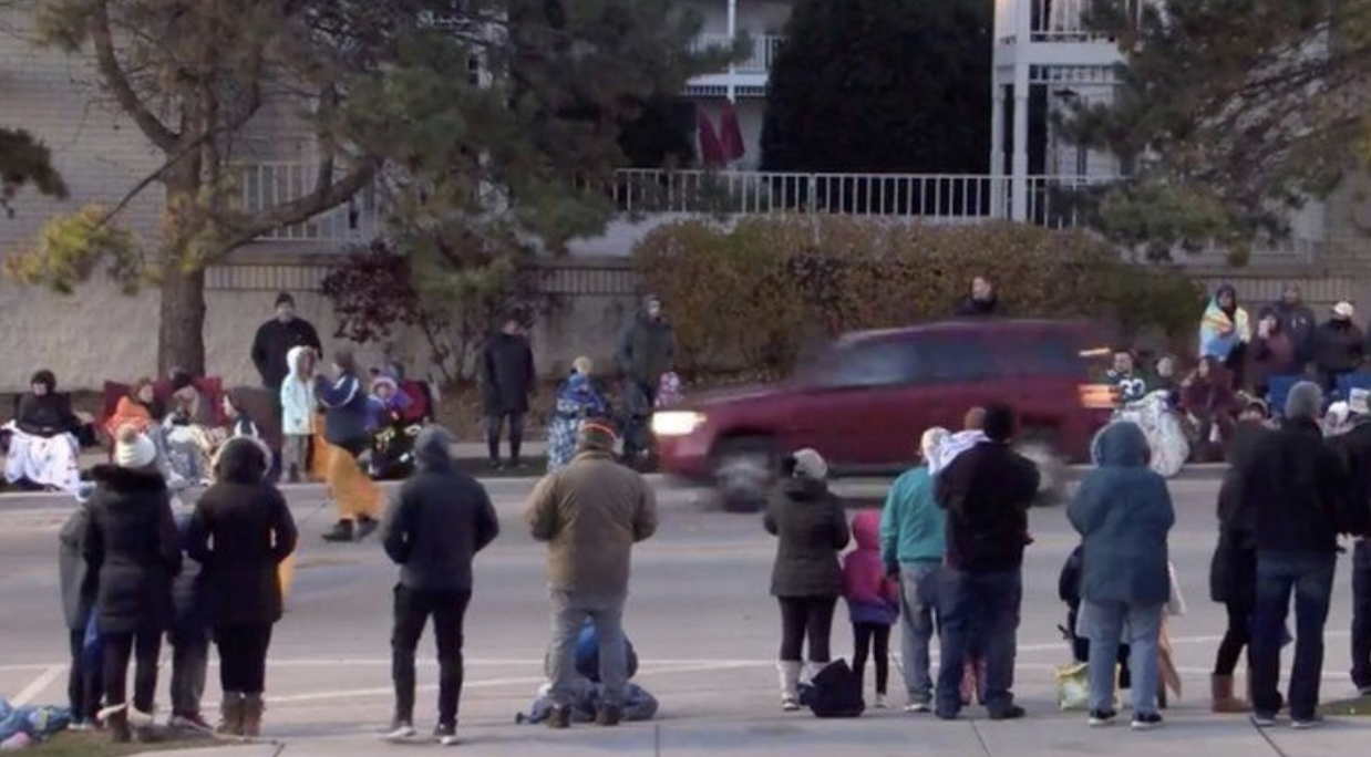 Red Suv ploughed into people at the parade