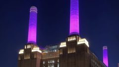 Battersea Power Station Chimneys lit up in purple to  take part in