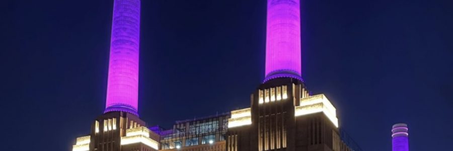 Battersea Power Station Chimneys lit up in purple to  take part in