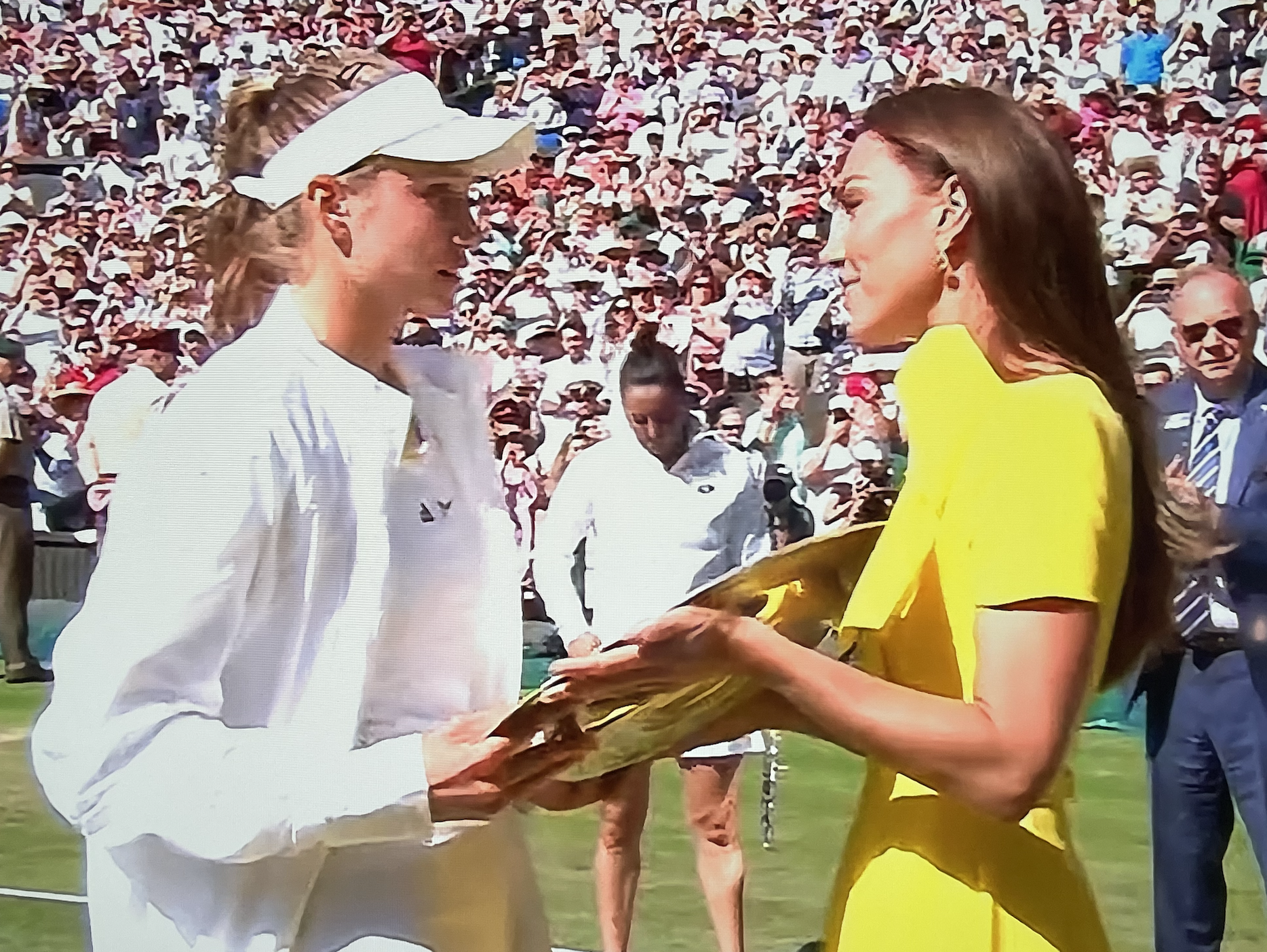 Duchess of Cambridge presenting the Women's singles trophy to Elena Rybekina