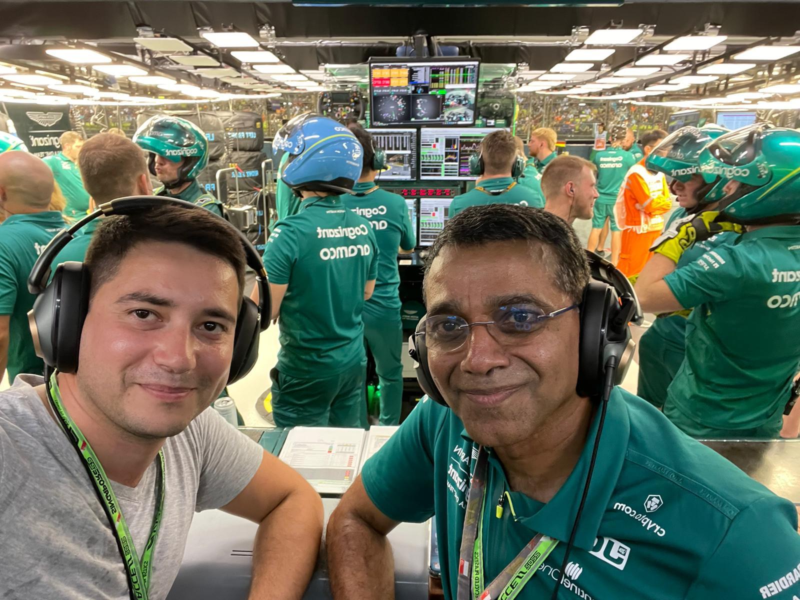 Laurence Price and Manoj Leela Niwas of Juniper Networks inside Aston Martin 's enclosures, at F1 Grand Prix at Singapore. grand